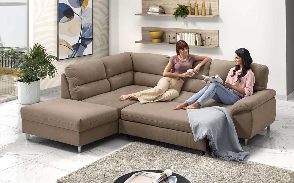 Grande divano angolare modello Zante con pouf contenitore, rivestimento in tessuto, ideale per open space